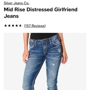 Women’s Silver, distressed, girlfriend jeans.  Size 32/12